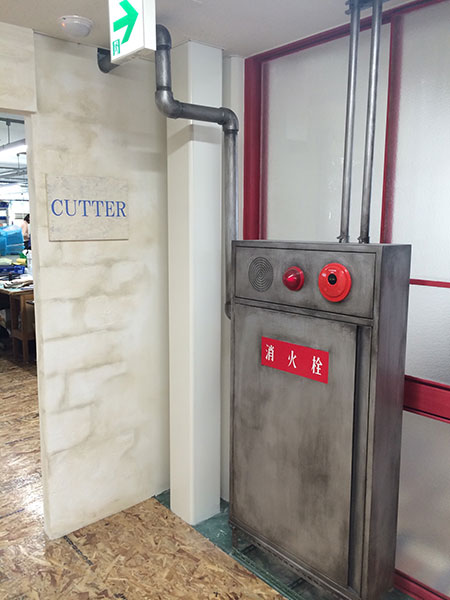 消火栓設備を空間デザインに馴染ませた、店舗内装の設備処理事例